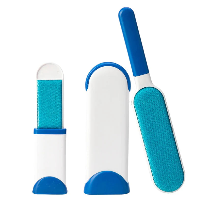 Set of three blue and white pet grooming tools on a white background