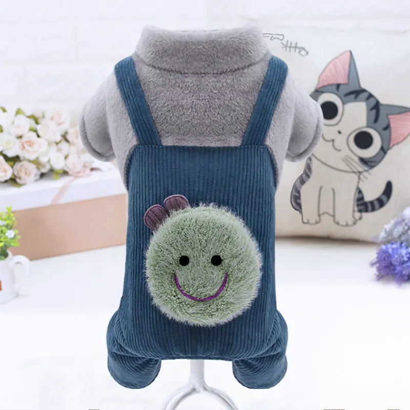 Pet outfit with a blue bag featuring a smiley face design on a white background.
